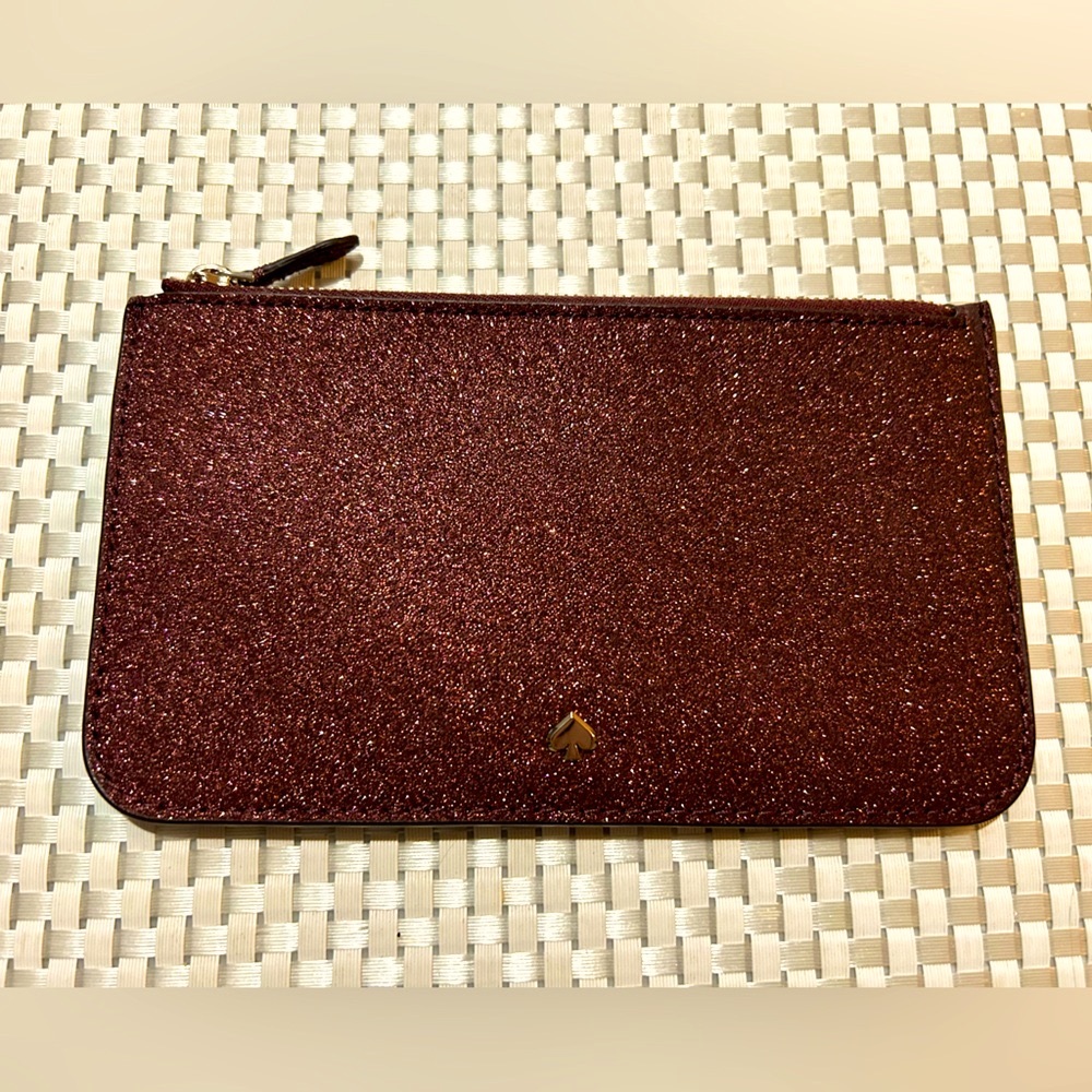 New Kate Spade sparkly burgundy wallet.
